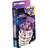 Spot it! Kpop Demon Hunters featuring a purple and yellow retail box with cartoon character graphics and a stack of circular colorful designs.