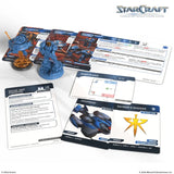 StarCraft tabletop game components including miniatures and cards on a white background