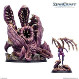 Two miniature figures from the StarCraft tabletop game on a white background
