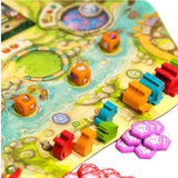A colorful board game setup with illustrated game board, orange dice, small plastic tokens, and several bright colored player pieces on a white background.