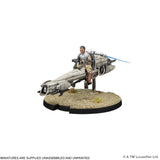 A painted sci-fi miniature model of a character riding a small gray vehicle on a textured desert-style base, shown against a plain white background with small copyright text at the bottom.