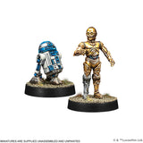 Two robot miniatures on black bases with a white background