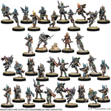 Collection of miniature figures on round bases against a white background