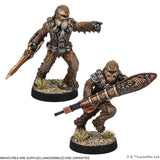 Two chewbacca figurines with detailed armor and weapons on a white background