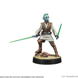 Figurine of a character from a science fiction series with a green lightsaber on a white background.