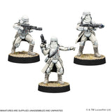 Three miniature figures on stands with a white background, featuring Lucasfilm branding.