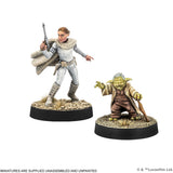 Two miniature figures on stands with a white background, featuring branding.