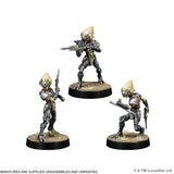 Three unpainted tabletop gaming miniatures of a sci-fi soldier species, shown in three different combat poses on round black bases with textured grass, against a plain white background.