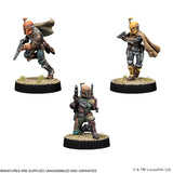 Three miniatures of a character resembling Boba Fett from Star Wars on a white background.