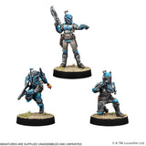 Three miniature figures of a character in futuristic armor on stands with a white background.