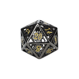 Black metal polyhedral dice with gold numbers on a white background
