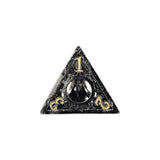 Triangular black object with gold numbering on a white background