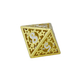 Gold metal dice with white numbers on a white background