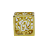 Gold cube with number 6 on a white background