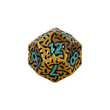 Gold and black dice with teal numbers on a white background