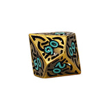 Gold and black dice with turquoise numbers on a white background