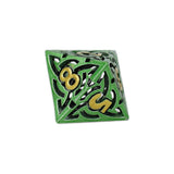 Green polyhedral dice with black patterns and gold numbers on a white background