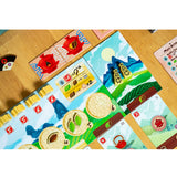 Colorful board game pieces on a wooden table