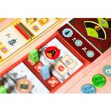 Close-up of a colorful board game with various tiles and numbers.