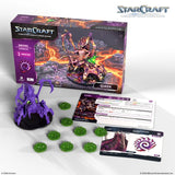 StarCraft tabletop miniature game set with box, figures, and cards on a white background