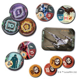 Collection of round game tokens with a spaceship tin in the center, featuring Lucasfilm branding.