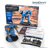 StarCraft Goliath mini figure with game box and cards on a white background