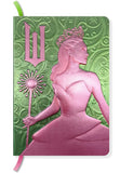 Notebook with a design of a woman holding a scepter on a green background