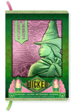 Wicked-themed reversible journal with Elphaba and Glinda on green and pink covers.