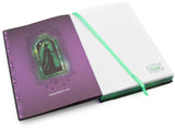 Open notebook with purple cover featuring a silhouette design on a white background