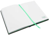 Open notebook with a green elastic band on a white background