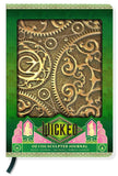Decorative journal with intricate gold design on a green background