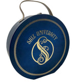 Blue circular container with 'Shiz University' and a logo on a white background