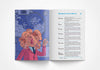 Open book showing a colorful illustration of a character with mutated features on the left page and text on the right page.