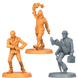 Three figurines in orange and gray on a white background