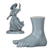Gray figurine of a person with a large foot model on a white background